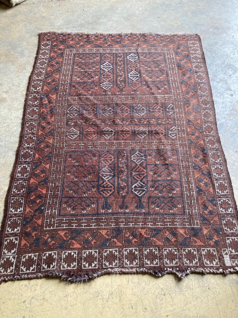 Four worn Persian rugs, largest 190 x 133cm